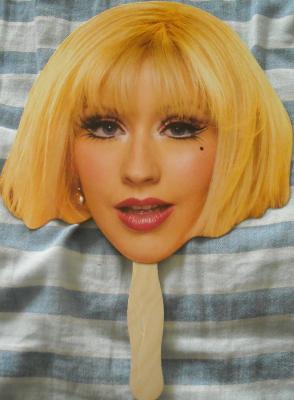 Burlesque movie promo Christina Aguilera mask on a stick