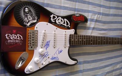Payable On Death (P.O.D.) autographed Fender Squier Bullet brown electric guitar