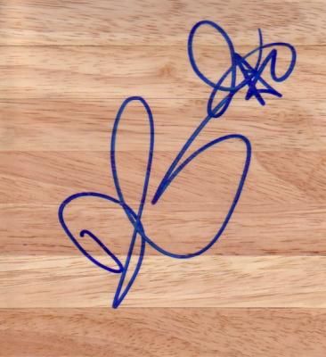 Drew Gooden autographed basketball hardwood floor