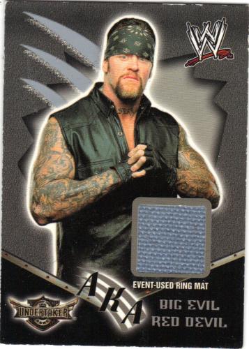 2002 fleer undertaker piece of mat