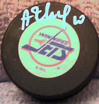 Alexei Zhamnov autographed Winnipeg Jets puck