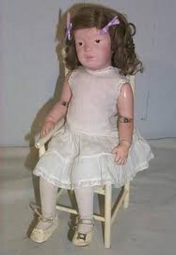 Antique Wooden Doll; Rocking Chair