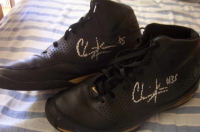 Chris Kaman autographed game worn pair of Nike Zoom shoes