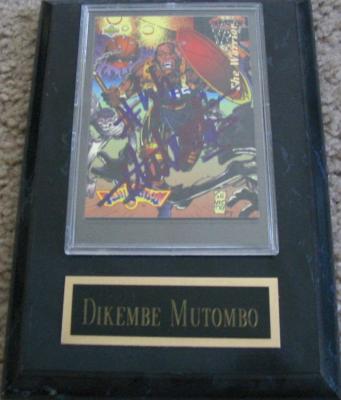 Dikembe Mutombo autographed Denver Nuggets card in plaque