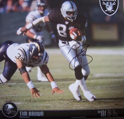 Tim Brown autographed Oakland Raiders calendar page