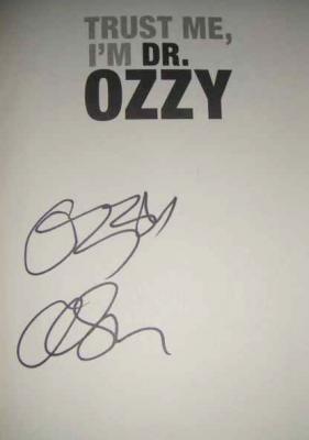 Ozzy Osbourne autographed Trust Me I'm Dr. Ozzy hardcover book
