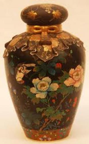 Antiques; Stunning antique vase has an incredible design