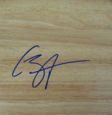 Caron Butler autographed basketball hardwood floor